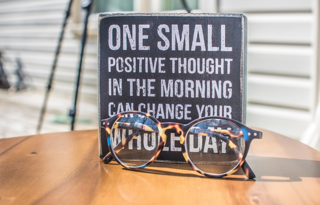 Image that says "One small positive thought in the morning can change your whole day" on a blog for powerful daily affimations. Above a list of affirmations.