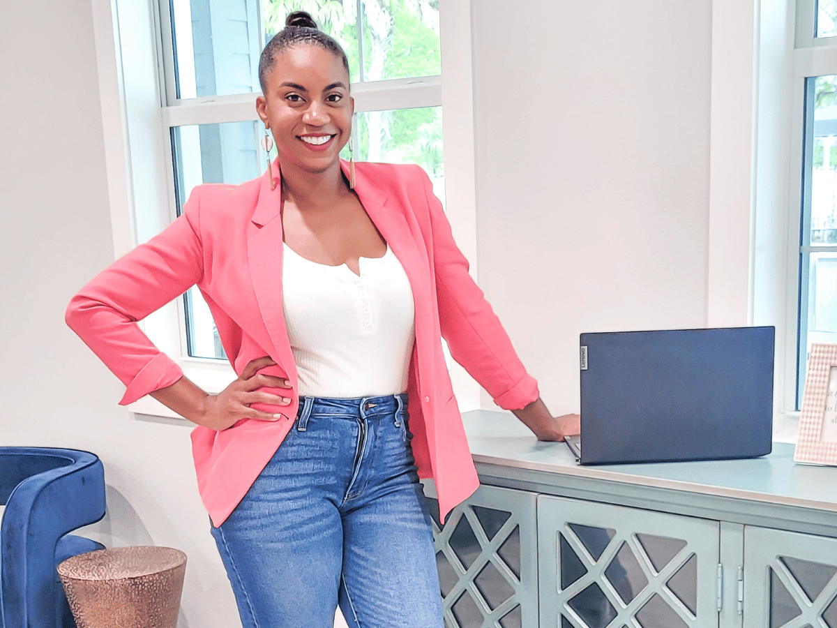 Image of Stephani Shepeherd standing in front of her laptop. She is the Founder of Great Life is a Must and has a blog that is the Ultimate source of life lessons and encouragement for women and moms who want more